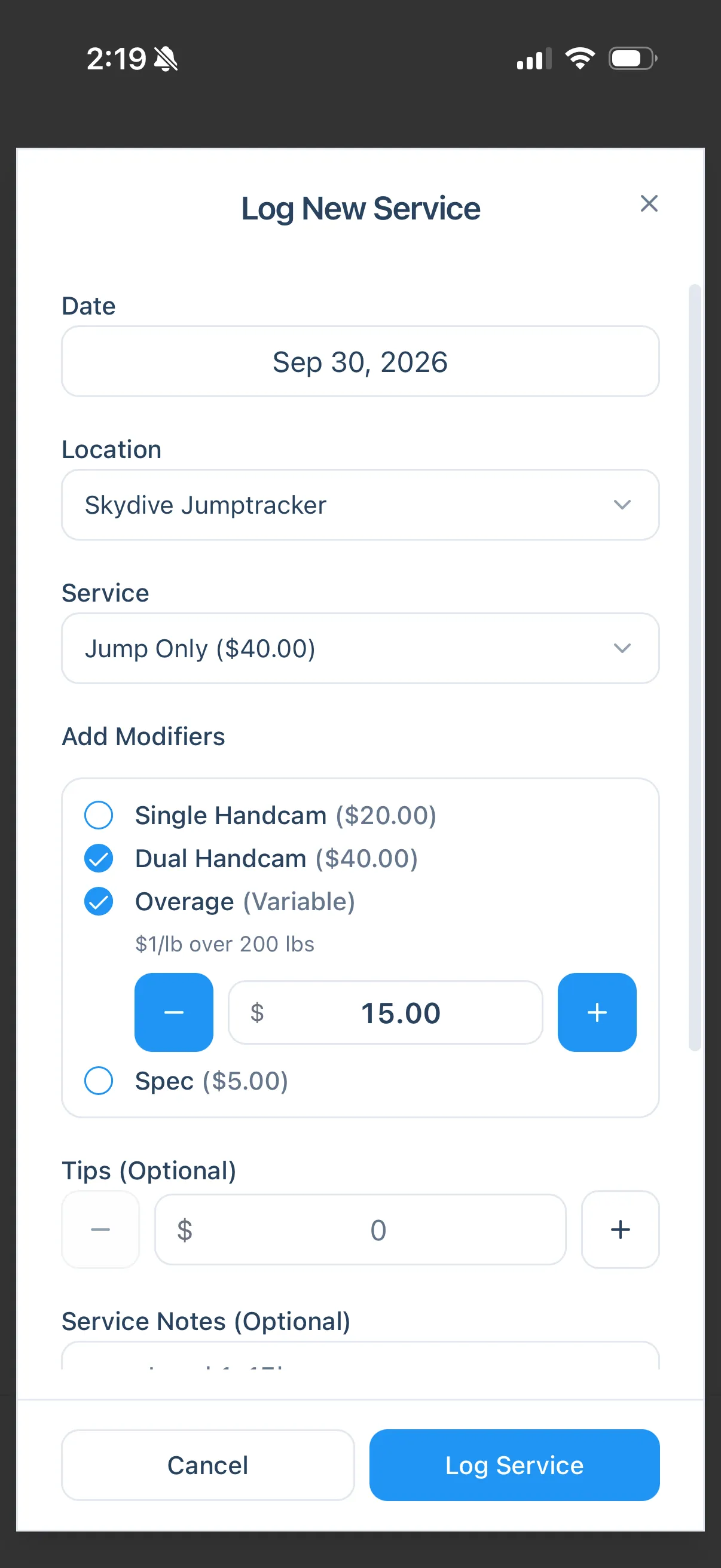 The Log New Service screen with Jump Only selected, Dual Handcam and Overage modifiers checked, and an overage of $15.00